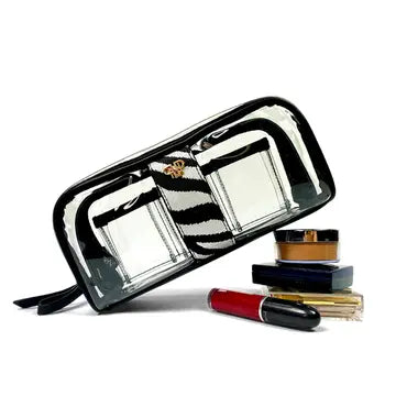 Makeup set with a black and white zebra-striped case on a white background