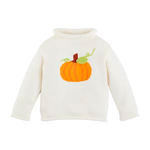 A white long-sleeved sweater with a turtleneck. On the front, there’s an embroidered design of an orange pumpkin with a brown stem and a green leaf and vine. The pumpkin is centered on the chest area of the sweatshirt