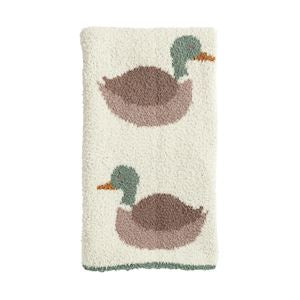Textured towel with duck designs on a white background