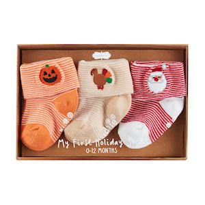 Three pack of Halloween. Thanksgiving, and Christmas socks for 0-12 month old babies