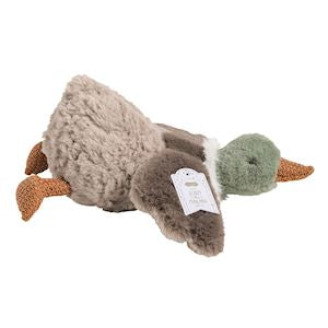Plush toy resembling a duck with a tag on a white background