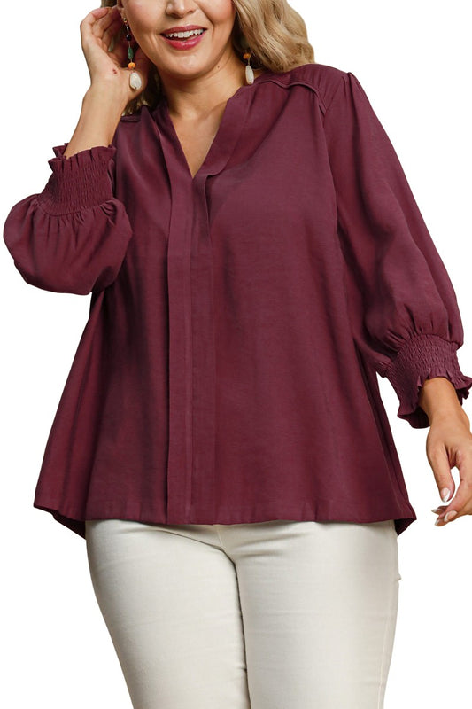 Wine color long sleeve top featuring stylish ruffle sleeves and contrast piping for a unique touch.