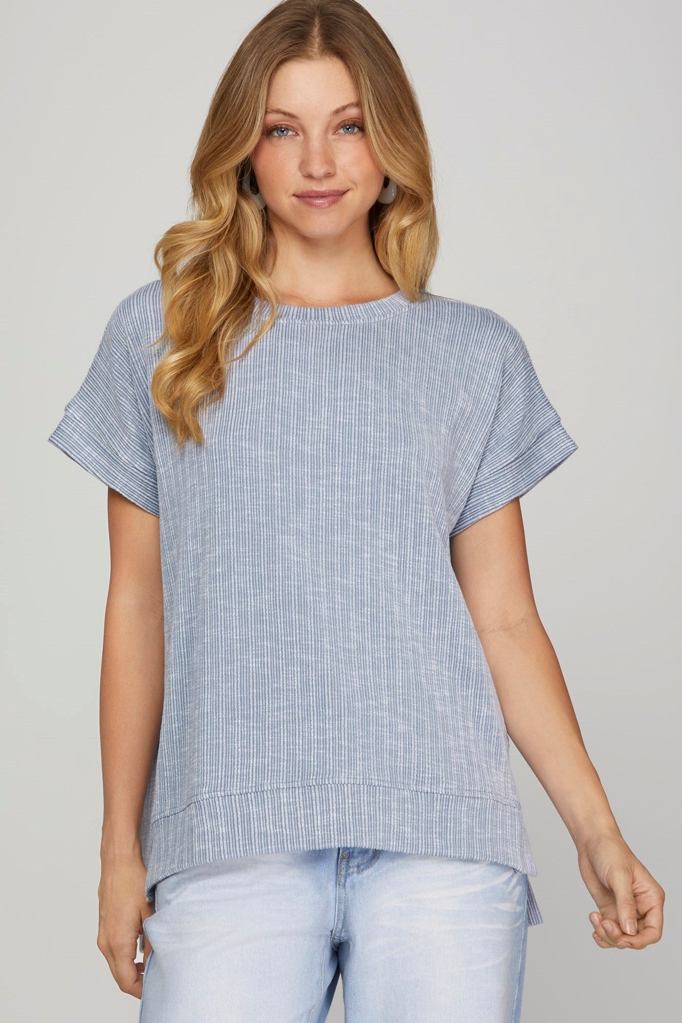 A periwinkle short sleeve ribbed knit top