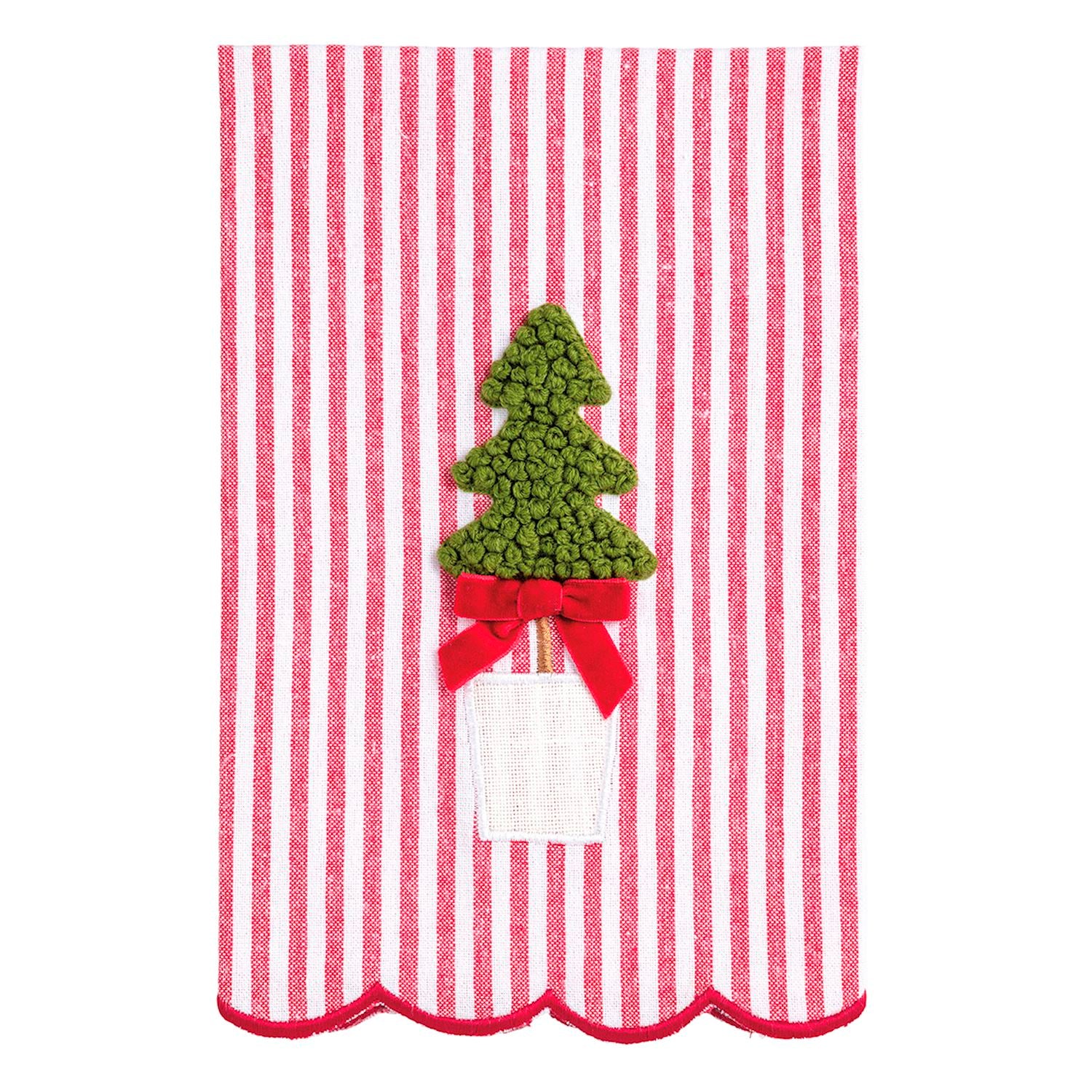 Red and white striped towel with a green Christmas tree and red bow design.