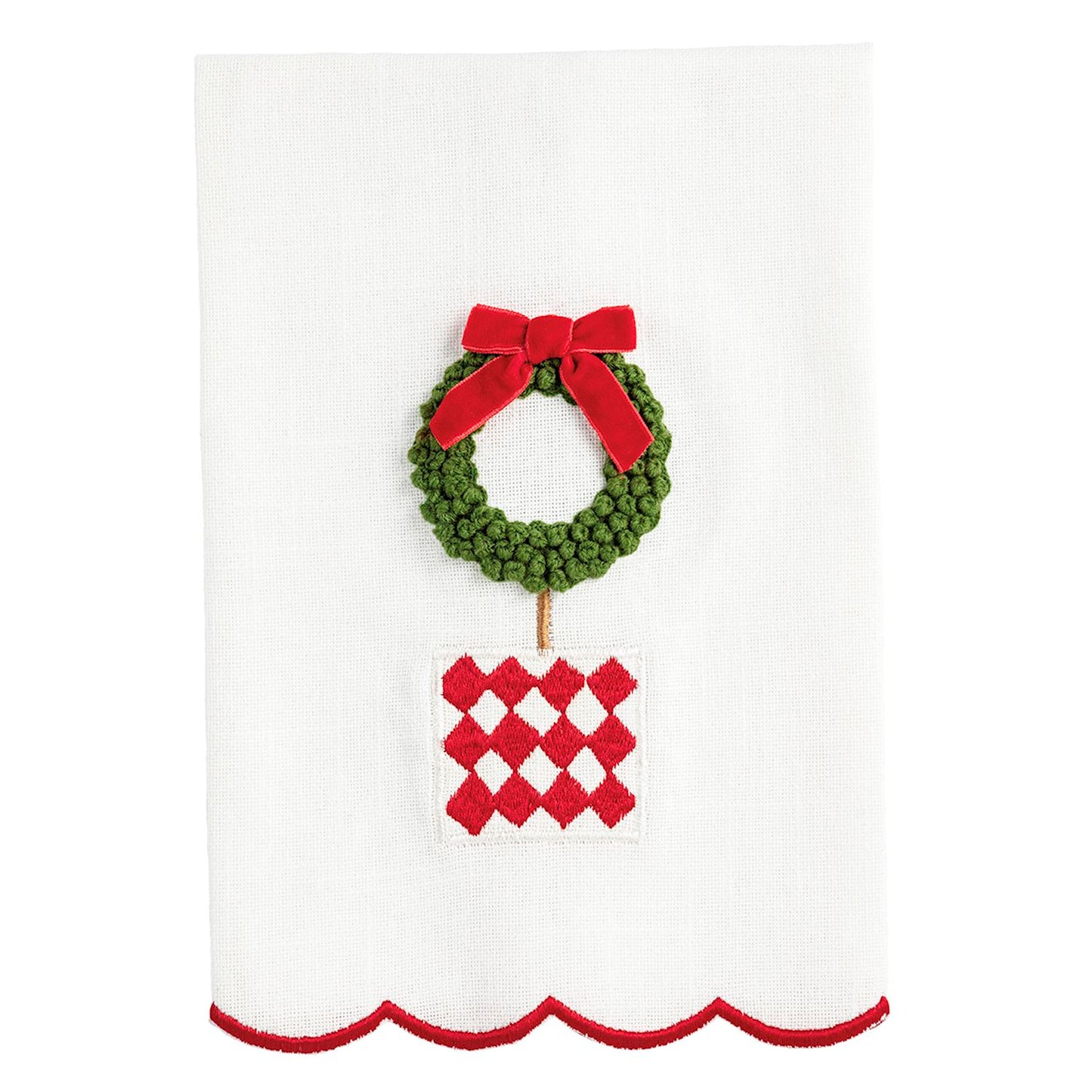 Decorative towel with a green wreath and red bow on a white background
