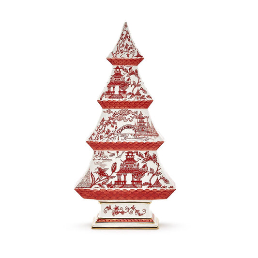 Decorative red and white ceramic Christmas tree on a white background