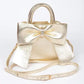Metallic Bow Front Top Handle Clutch
