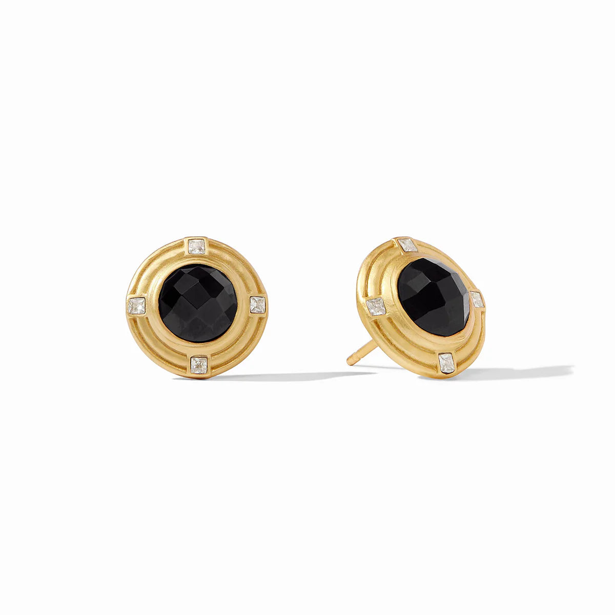 Disc gold stud with black jewel in center and four diamond studs around gold plate. 