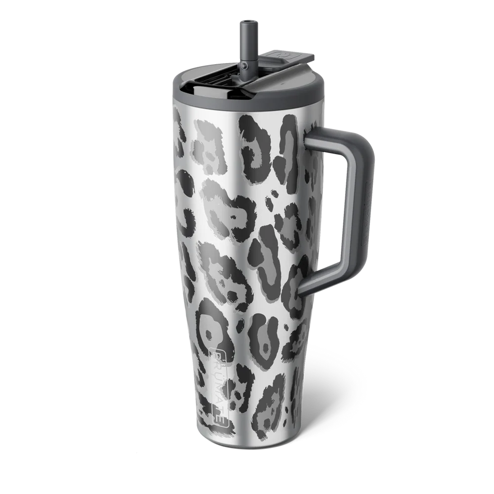 A stainless steel travel tumbler with a gray leopard print pattern, featuring a dark gray handle, lid, and straw, shown on a white background.