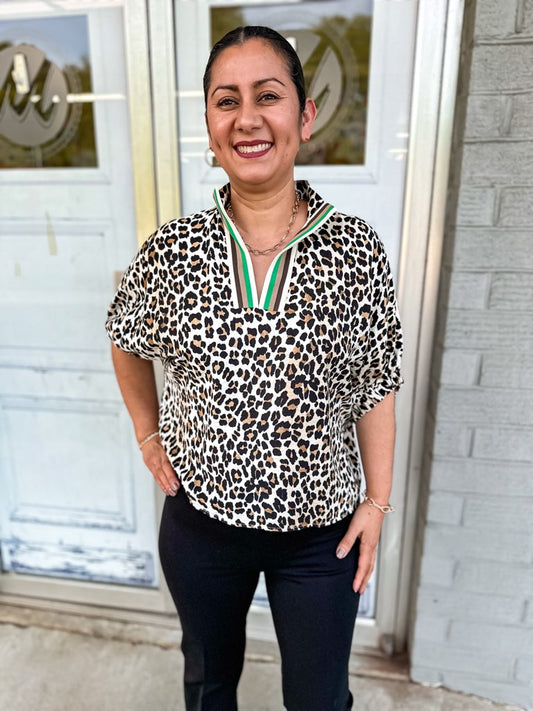 Elizabeth top in leopard pink, high neck, and elasticated sleeve band with green and brown rib band split neck.
