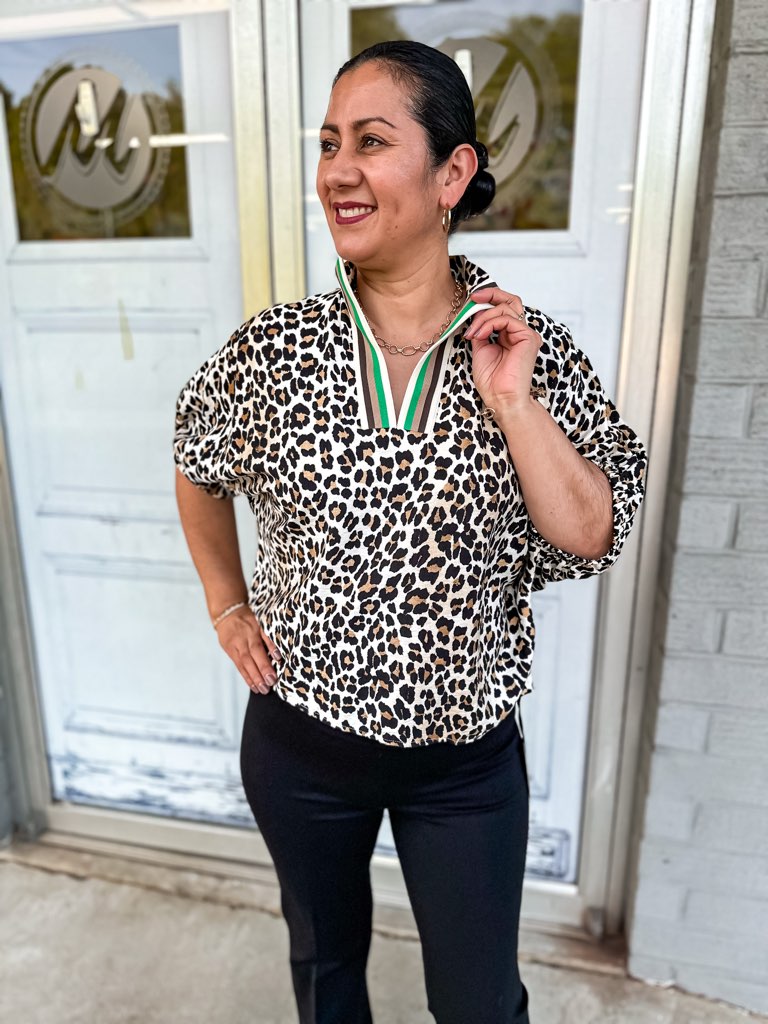 Elizabeth top in leopard pink, high neck, and elasticated sleeve band with green and brown rib band split neck.