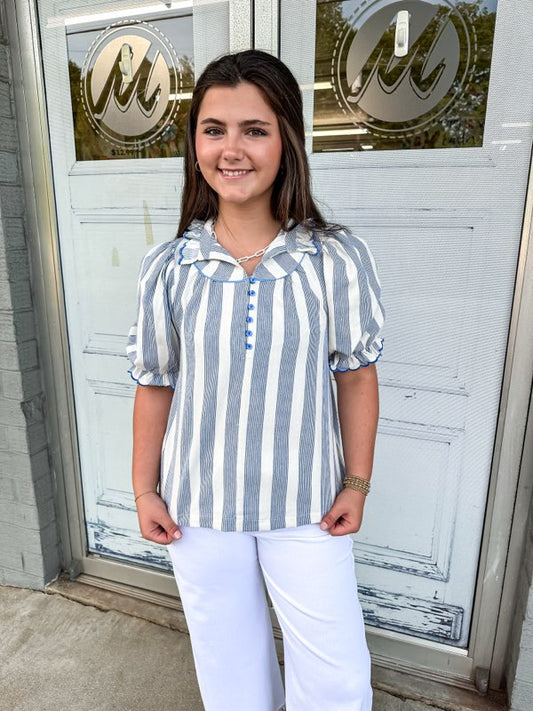 Jayne top a high ruffled collar with a button-up front and puff sleeves and elastic ruffle cuffs with blue and cream strips.