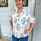 Shyann top with smocking detail with 3/4 length sleeves with a paisley print in blue mix.