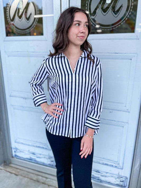 Agnes black stripe 3/4 sleeve length top with gingham accent cuffs.