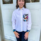 Marina boxy, relaxed fit shorter length long sleeve button down top. With an oversized pocket with multicolor leopard design.