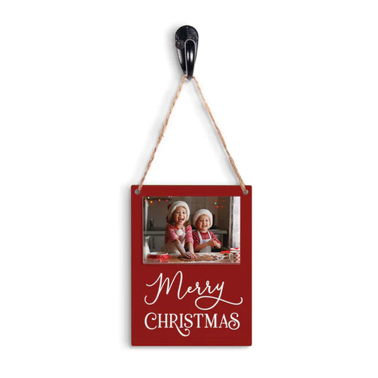 Red hanging frame with "Merry Christmas" scripted in white.