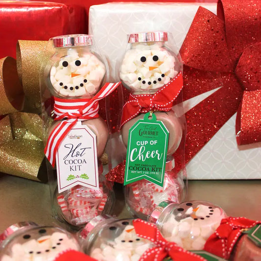  A Snowman Cocoa Set with a festive, 3-tiered snowman filled with delicious cocoa.