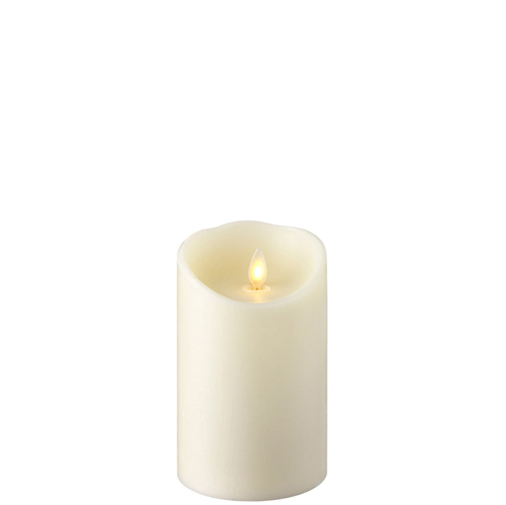 Fake push flame candle in ivory, 3.5" X 5" in size. 