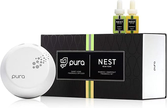 Pura Smart Home Diffuser and two Difusser refills by nest in the scents bamboo & grapefruit.