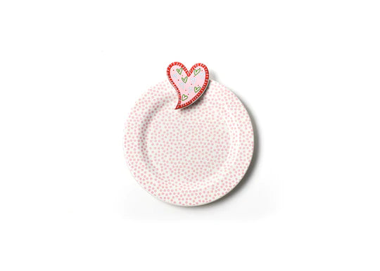 Mini desert serving plate, white base with small pink dots with small ceramic heart at the top of the plate.