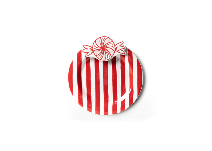 Mini desert serving plate, white base with red stripes with small ceramic peppermint at the top of the plate.