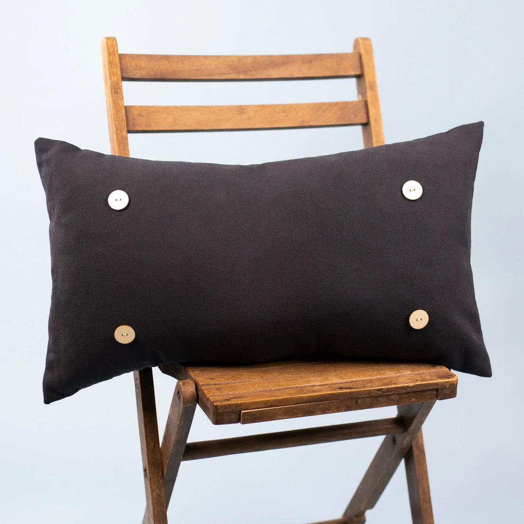 Black Pillow with Four wooden buttons in each corner to add pillow attachment 