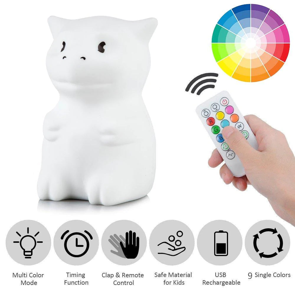 White silicon Dragon sitting up that lights up on touch, or with remote (included in picture)